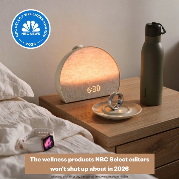 A high-end nightstand display featuring a smart alarm clock, wellness ring, and water bottle to establish a premium morning routine aesthetic.